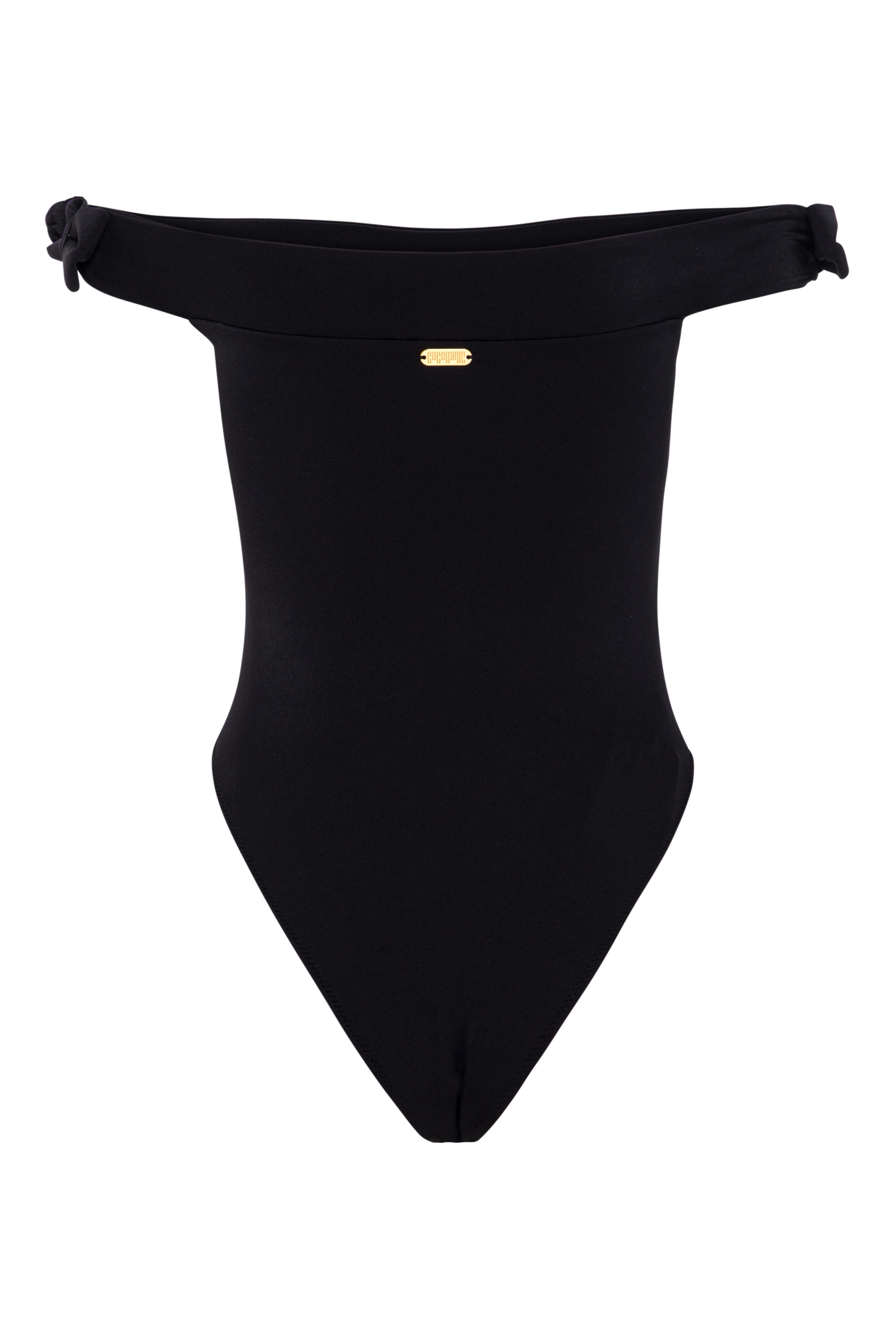 Feminine bow accent swimsuit photographed for yacht vacation look