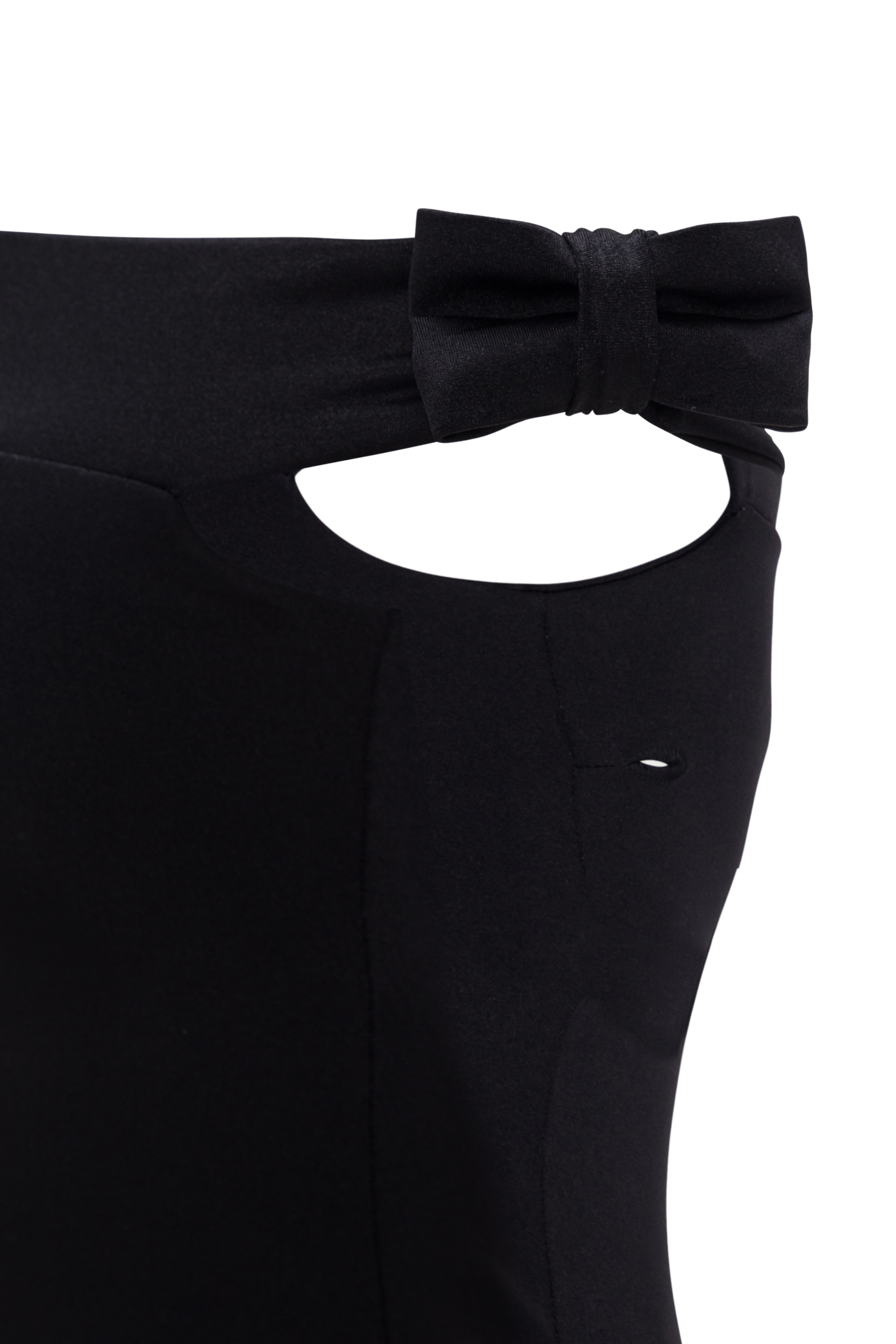 Elegant feminine one-piece with bow accents for Riviera glamour